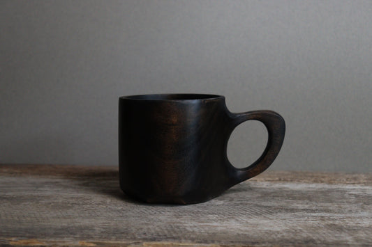 blackened cherry handled mug